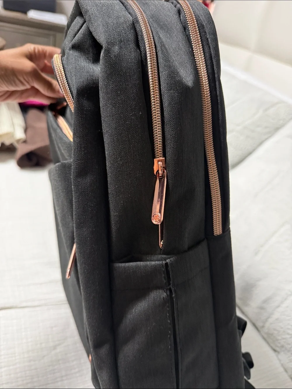 Used Black women Backpack with Rose Gold Accents